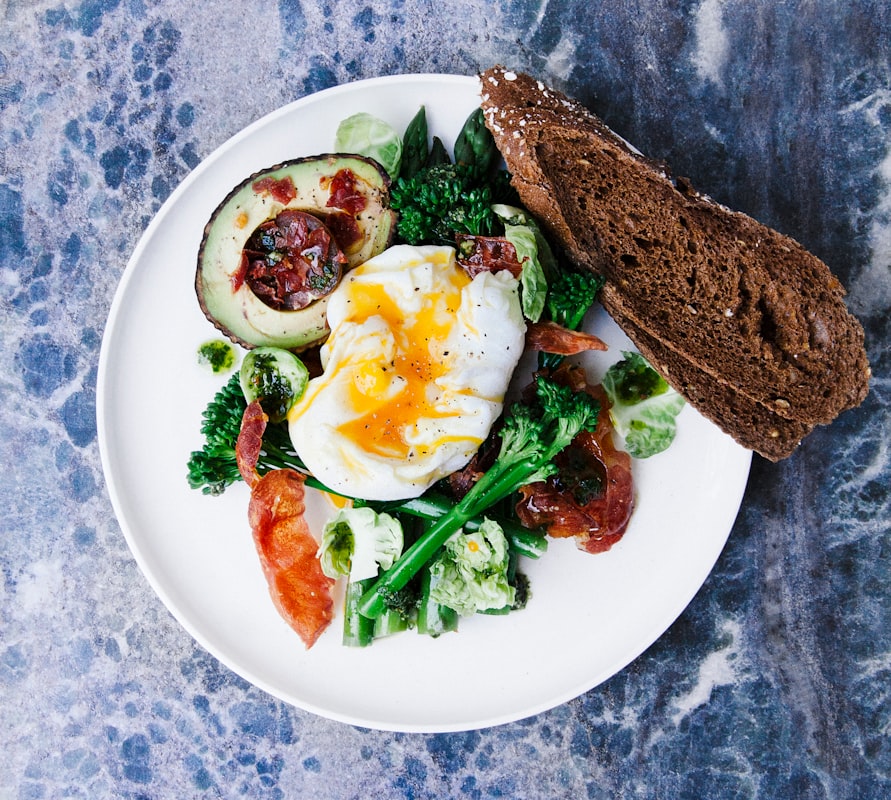 Sports nutrition professional analyzing athlete diet